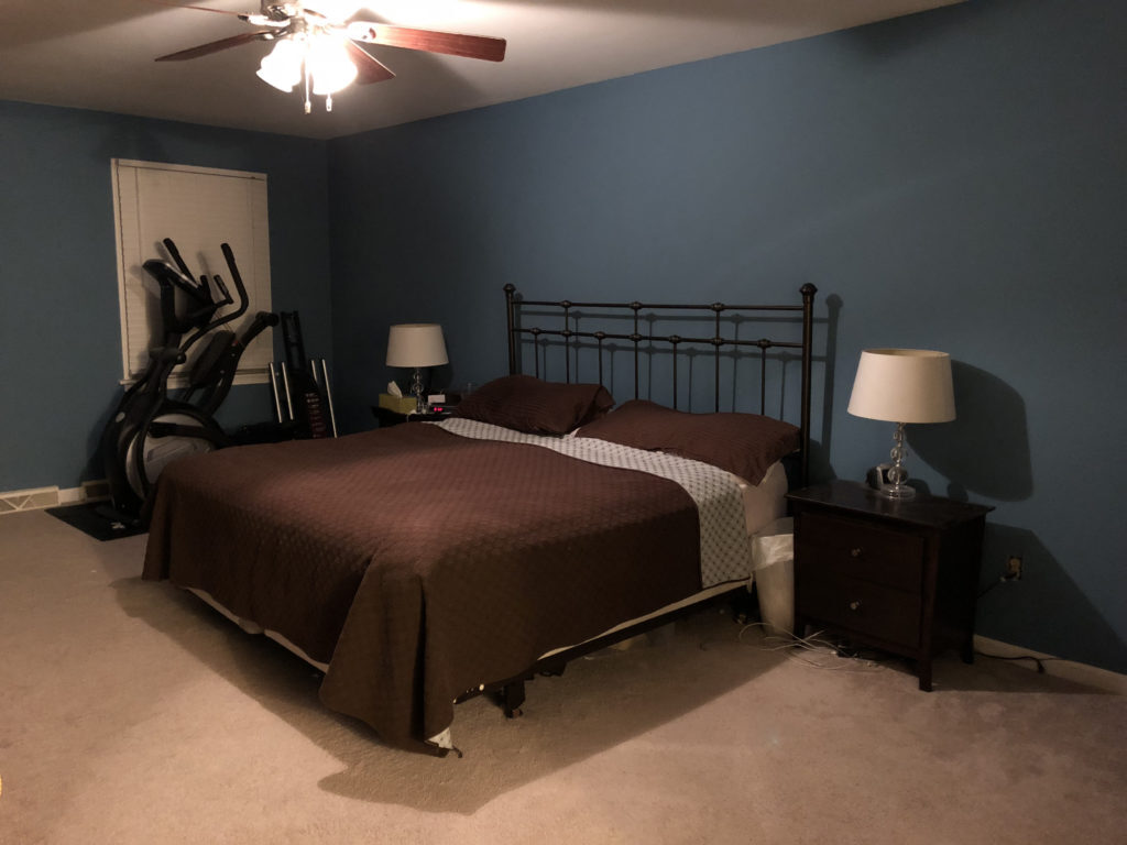 Before renovation - original bedroom with basic decor